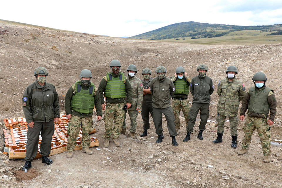 A combined EUFOR team destroy old ammunition